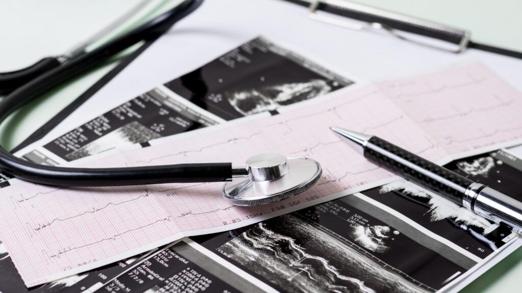 Malfunctioning medical device positioned above chest X-rays, illustrating potential defects.