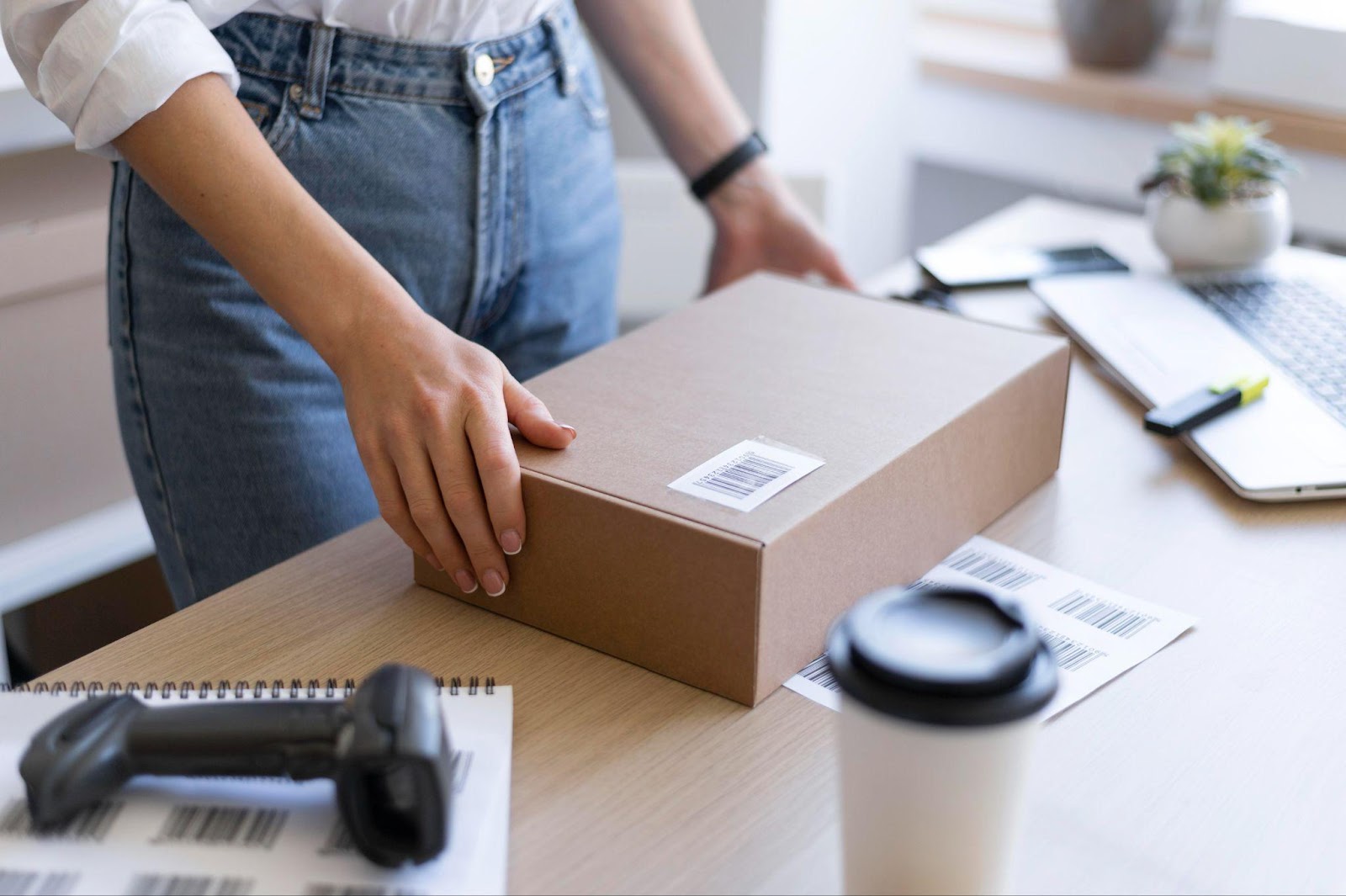 Person eagerly inspecting newly delivered package, having product safety checklist.