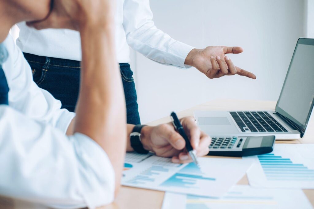 A client discussing with a lawyer, explaining that they were paid less than expected, exploring options for addressing wage discrepancies.