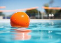 A swimming pool with clear blue water, symbolizing leisure and relaxation. This image relates to swimming pool safety, emphasizing the importance of preventing accidents and drownings through proper precautions and supervision.